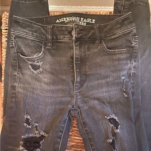 Black distressed skinny jeans